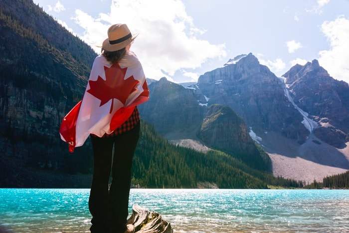 girl and the Canadian flag